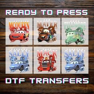 May include: A set of six DTF transfers featuring characters from the movie Cars, including Lightning McQueen, Mater, Fillmore, Sally, and Mack. Each graphic includes the character name in bold text above the vehicle on a white background.