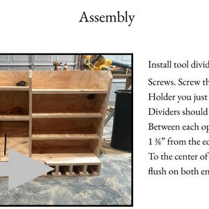 May include: A wooden tool organizer with multiple compartments, shelves, and slots. The text "Assembly" is at the top, with instructions to install tool dividers using 1 1/4" finish screws. The organizer is unfinished and appears to be handmade.