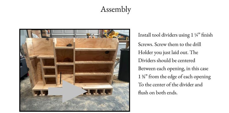 May include: A wooden tool organizer with multiple compartments, shelves, and slots. The text "Assembly" is at the top, with instructions to install tool dividers using 1 1/4" finish screws. The organizer is unfinished and appears to be handmade.
