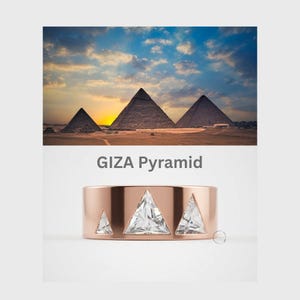 May include: A rose gold band ring featuring three triangular clear gemstones of varying sizes set into the metal. Above the ring, an image shows the Giza pyramids at sunset with the text GIZA Pyramid printed in gray below the image.