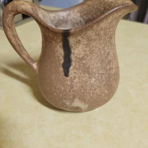 McCartys small nutmeg Pottery Pitcher