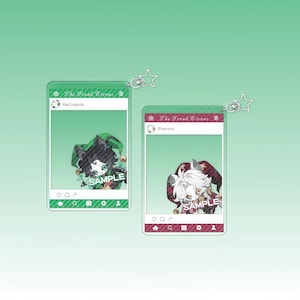 Könnte beinhalten: Zwei Acryl-Anhänger mit Cartoon-Charakteren in einem Social-Media-Interface-Design. Ein Anhänger hat einen grünen Rahmen mit einem schwarz-grünen Charakter, der andere einen roten Rahmen mit einem weiß-roten Charakter. Beide haben sternförmige Schlüsselanhänger.