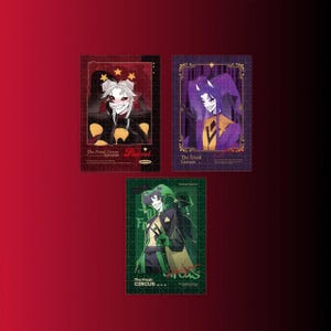 May include: Three art prints featuring stylized characters from "The Freak Circus." The prints have a dark red, purple, and green color scheme. Each print has a different character with a unique design. The text "The Freak Circus" is visible on each print.