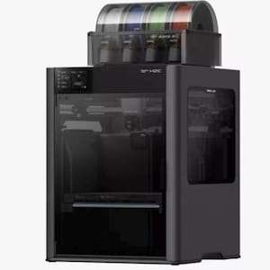 May include: A black 3D printer with a clear front panel and a filament storage unit on top. The storage unit contains multiple spools of filament in various colors. The printer has the text "S H2C" on the front.