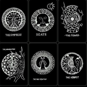 May include: Black and white tarot card deck featuring illustrations of the major arcana cards. The cards include The Magician, The Empress, Death, The Tower, The Hanged Man, The Fool, The High Priestess, The Hermit, The Sun, and The Moon.