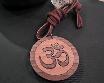 Solid Walnut and Maple OM  2in Diameter Necklace with cord