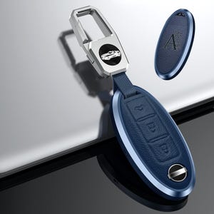 Anpassningsbart nyckelfodral passar Nissan 370Z Altima Maxima Murano March Rogue Sentra Versa titanmetalllädernyckelfodral 2/3 knappar