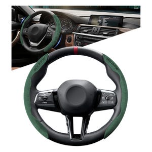 May include: A black and green steering wheel with the text "DRIVE IN STYLE" on the left side. The wheel has a red stripe at the top and is set inside a car interior.