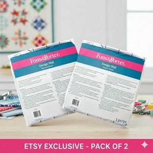 Könnte beinhalten: Zwei Fons & Porter Design Wall-Pakete. Jedes Paket hat einen weißen Hintergrund mit einem türkis-rosa Streifendesign. Der Text "Fons & Porter" und "Design Wall" sind auf der Vorderseite aufgedruckt. Die Pakete sind mit "ETSY EXCLUSIVE - PACK OF 2" gekennzeichnet.