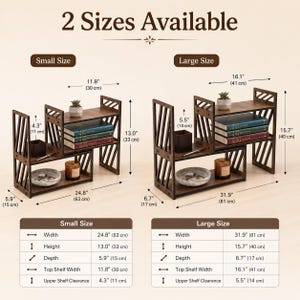 May include: Two dark brown wooden adjustable desktop shelves with diagonal slat side panels. The small size measures 63 cm wide, 33 cm high, and 15 cm deep. The large size measures 81 cm wide, 40 cm high, and 17 cm deep.