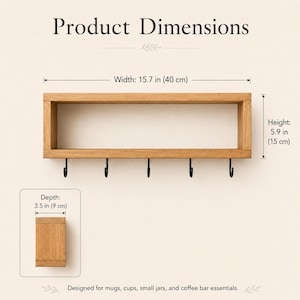 May include: A rectangular light brown wooden wall shelf with five black metal hooks attached to the bottom edge. The shelf measures 15.7 inches in width, 5.9 inches in height, and 3.5 inches in depth. Text reads Product Dimensions.