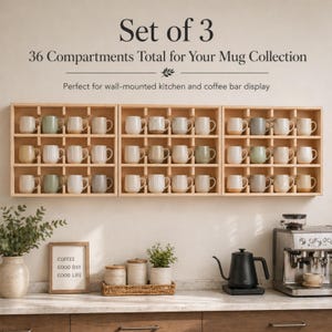 May include: A set of three light-colored wooden wall-mounted display shelves, each featuring twelve individual square compartments. The shelves are filled with various ceramic mugs in neutral tones, totaling thirty-six storage spaces.