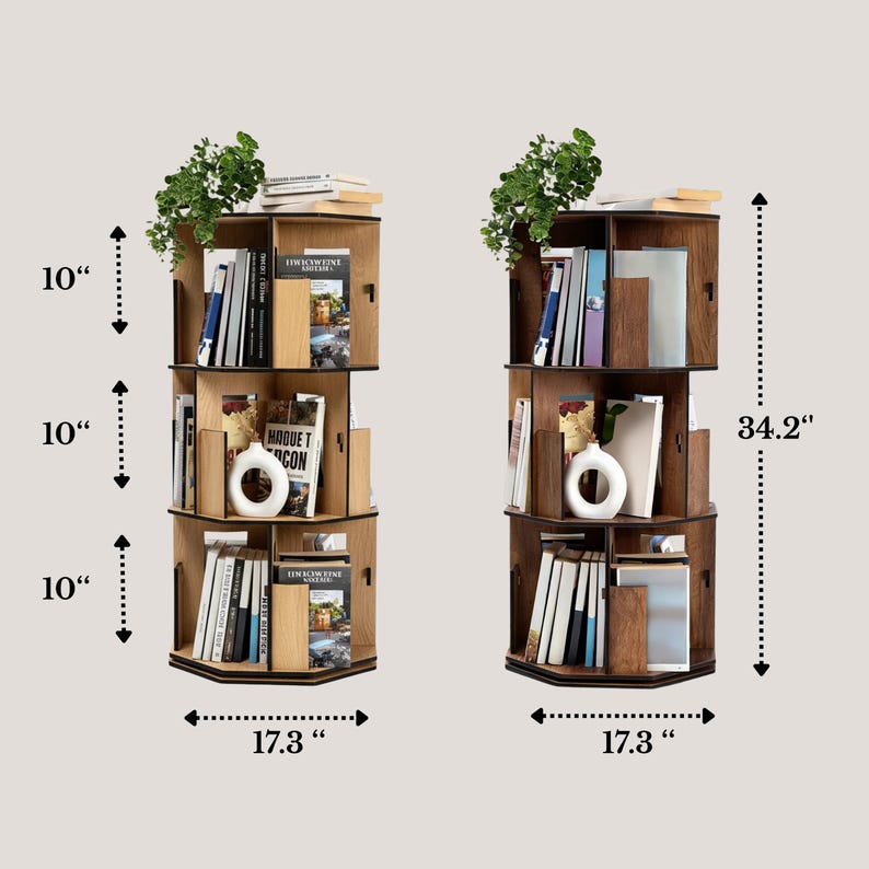 May include: Two wooden, rotating bookshelves, each with three tiers, filled with books and decorative items. The shelves are 17.3 inches wide and 34.2 inches tall. Each tier is 10 inches high. Green plants sit atop each shelf.