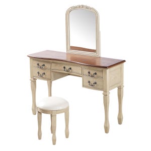 May include: A cream-colored vanity set with a matching stool. The vanity has a rectangular wooden top with a brown border, a mirror, and multiple drawers with ornate handles. The stool has a white cushioned seat.