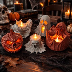 May include: A collection of five decorative Halloween candle holders featuring a carved pumpkin, a ghost, a skull, and two spectral figures. Each piece is crafted from resin and holds a small, battery-operated LED tea light that emits a warm glow.