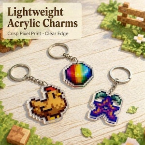 May include: Three lightweight acrylic charms with keychains. One charm is a pixelated rainbow sphere, another is a pixelated chicken, and the third is a pixelated purple bow. The text "Lightweight Acrylic Charms" is at the top.