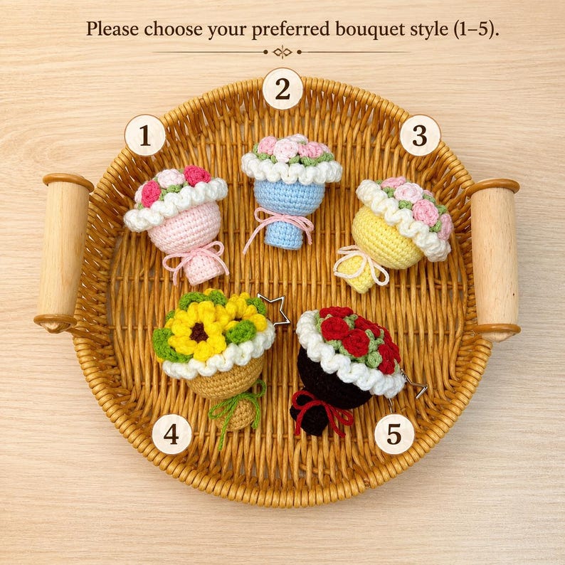 May include: Five small crocheted flower bouquets arranged in a round wicker basket. Each bouquet is numbered 1 through 5 and features different colored yarn flowers, including pink, yellow, and red, with white crocheted borders and tied ribbons.