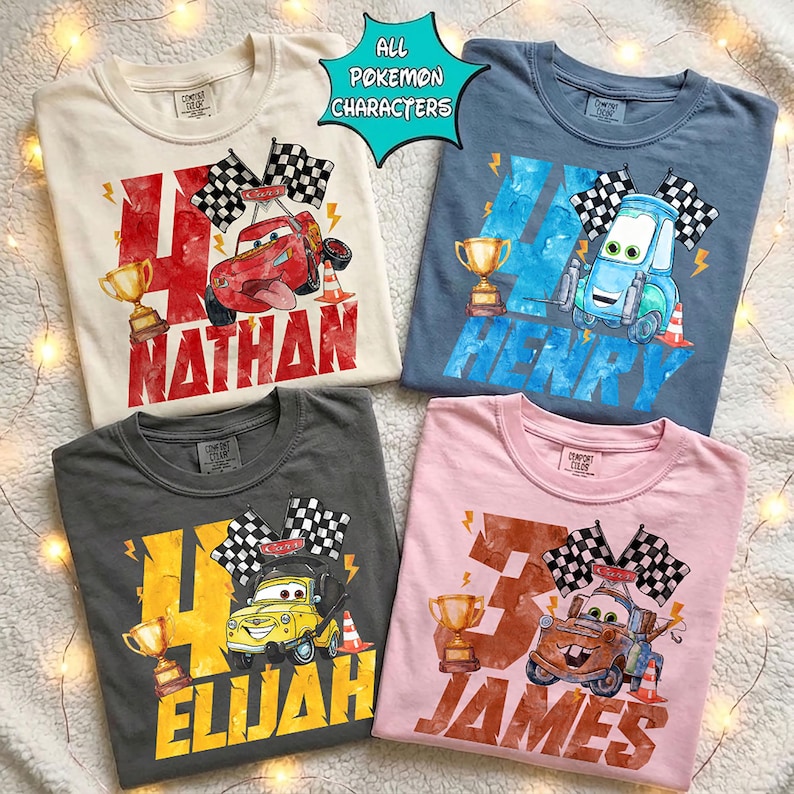 May include: Four Comfort Colors t-shirts in cream, blue, charcoal, and pink. Each shirt features a cartoon race car design with a trophy, checkered flags, and a name. The text "All Pokemon Characters" is in a teal bubble.