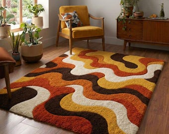 May include: A retro-style area rug with a wavy pattern in shades of brown, orange, yellow, and cream. The rug is rectangular and placed on a hardwood floor. The room also features a mustard-colored chair and various potted plants.