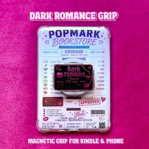 May include: A rectangular magnetic grip for a phone or Kindle featuring a black credit card design with the text Dark Romance Bank. The grip is mounted on a white backing card printed with a receipt from Popmark Bookstore, including details like receipt number 1313, a status of Approved, and various book-themed icons.