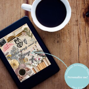 May include: A black e-reader shows a collage with a butterfly, camera, flowers, and text that reads "This Kindle is lovingly owned by Tiffany." A cup of coffee sits beside the e-reader on a wooden surface. A light blue circle with text that reads "Personalise me!" is in the bottom right corner.
