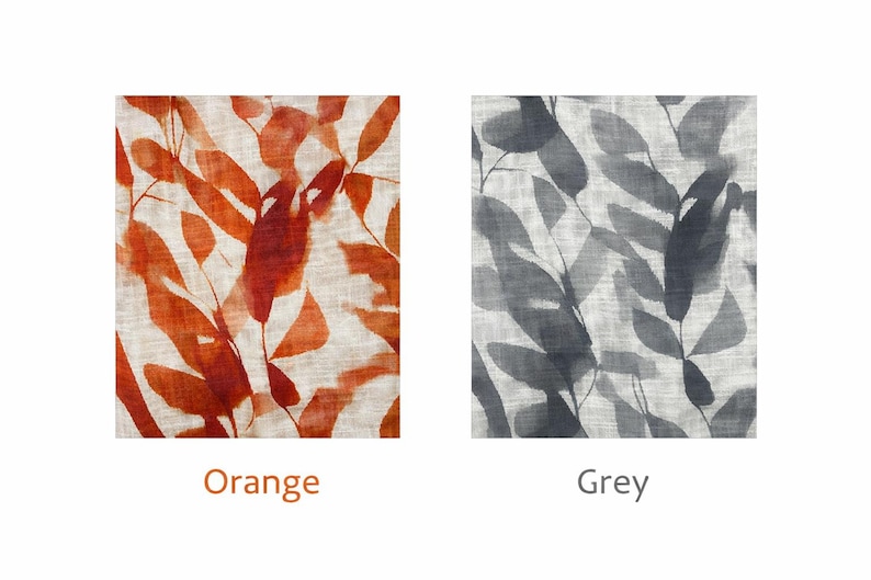May include: Two fabric swatches with leaf patterns. One features orange leaves on a cream background, labeled "Orange." The other displays grey leaves on a cream background, labeled "Grey."