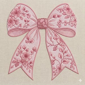 以下が含まれることがあります： ピンク色の刺繍リボン、花のディテール付き。リボンは、複雑なステッチと花と葉の繊細なデザインが特徴です。リボンはニュートラルな背景に配置され、詳細な刺繍を強調しています。