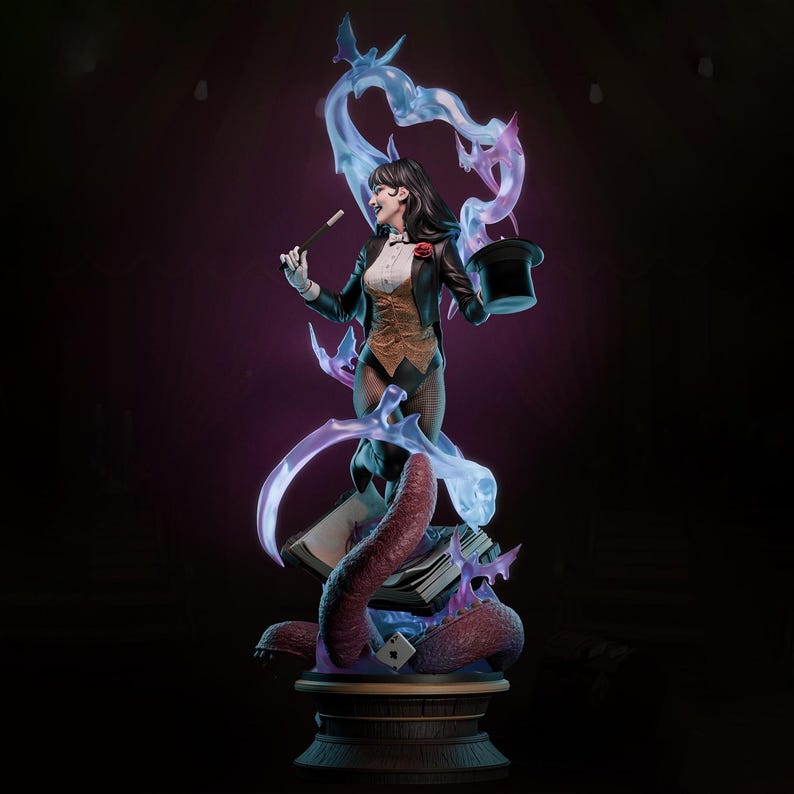 May include: A statue of a woman in a magician's outfit, holding a wand and a top hat. She is surrounded by swirling blue and purple smoke. The statue is on a wooden base with a tentacle-like structure and playing cards.