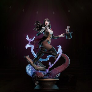 May include: A detailed statue of a female magician in a classic outfit, holding a top hat with a rabbit. The figure is posed dynamically, with a flowing cape and intricate details. The base features a book, tentacles, and magical effects.