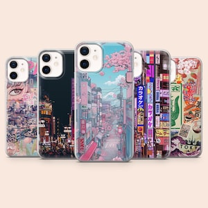 以下が含まれることがあります： 5つのユニークなデザインの携帯電話ケースのコレクション。ケースには、都市景観、桜、日本風のグラフィックのカラフルなイラストが描かれています。各ケースは異なるデザインで、さまざまな美的選択肢を提供しています。