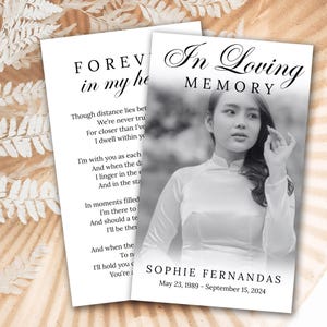 May include: Two memorial cards. One features a poem and the words "FOREVER in my heart". The other card says "In Loving Memory" and includes a black and white photo of a woman, her name, and dates.