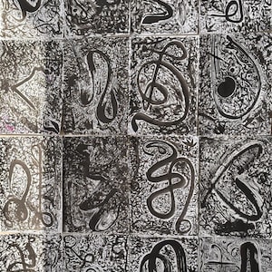 May include: A collection of sixteen black and white abstract art pieces. Each piece features bold, flowing black ink shapes and lines against a textured, splattered white background. The artwork evokes a sense of movement and depth.
