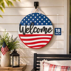 Round Wooden Welcome Sign Patriotic Door Hanger Americana Wall Hanging Front Porch Display American Flag Stars Stripes Design Hand Painted Three Layer Wood Construction Perfect Fourth July Memorial Day Veterans Gift Farmhouse Style Entryway