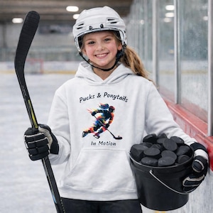 Hockey Girl Apparel Rainbow Colored Design Female Player Representation Team Spirit Wear Athletic Fashion Statement Sports Enthusiast Gift Hockey Fan Clothing Ponytail Player Silhouette Graphic Ice Hockey Team Support Colorful Pattern Women