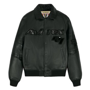 May include: A black leather varsity jacket featuring a fold-down collar, snap-button front closure, and ribbed cuffs and hem. The chest displays the text 'Avirex' in raised black lettering, with a matching black graphic patch below the text.