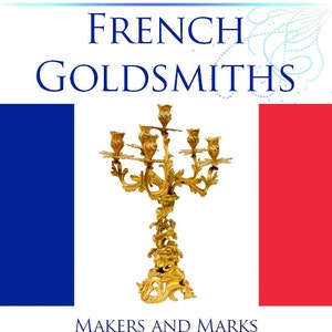 May include: A book cover with the title "French Goldsmiths: Makers and Marks from 1672" by Wilfred Joseph Cripps. The cover features a gold candelabra against a French flag background.