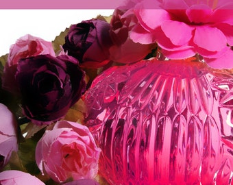 May include: A pink glass bottle with a textured surface, surrounded by pink and purple flowers. The title "The Art of Perfumery" is displayed above the bottle, and the text "By G.W. Septimus Piesse" is below the bottle.