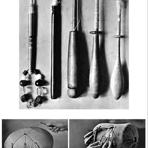 May include: Five different types of wooden bobbins used for hand spinning yarn. The bobbins are arranged in a row from left to right. The bobbins are made of different types of wood and have different designs. The bobbins are used to hold the yarn as it is spun.