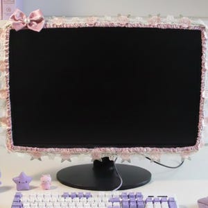 Capa protetora de TV com renda floral para monitor.