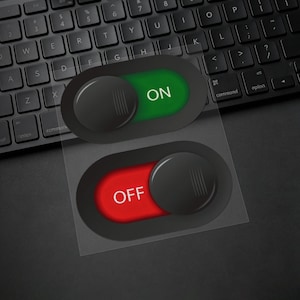 May include: Two oval-shaped toggle switch stickers on a transparent sheet. The top sticker features a black slider on a green background with the white text ON. The bottom sticker features a black slider on a red background with the white text OFF.