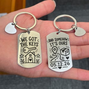 Conjunto de chaveiros "Nós temos as chaves", presente perfeito para casais que acabaram de comprar uma casa.