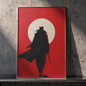 Peut inclure: Impression d'art encadrée représentant une silhouette noire d'une figure en manteau long, tenant une épée, sur fond rouge avec un cercle blanc et des oiseaux. L'œuvre a un style minimaliste.