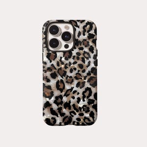 May include: A smartphone case with a leopard print design. The case features a pattern of black, brown, and cream-colored spots. The case has a glossy finish and is designed to fit a smartphone with multiple camera lenses.