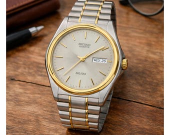Vintage Japan SEIKO SQ Two Tone Fluted Bezel Quartz Roman Numerals