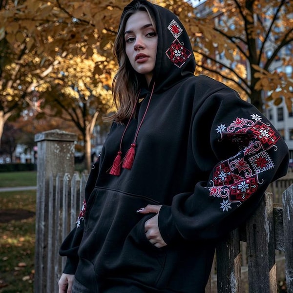 Hoodie with embroidery on the sleeves and hood.