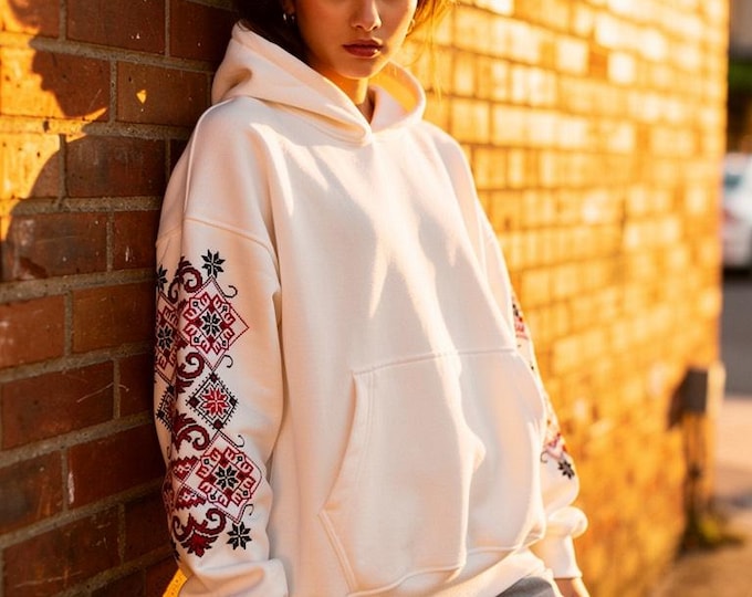Hoodie with embroidery on the sleeves.
