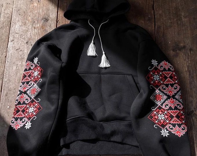 Hoodie with embroidery on the sleeves.