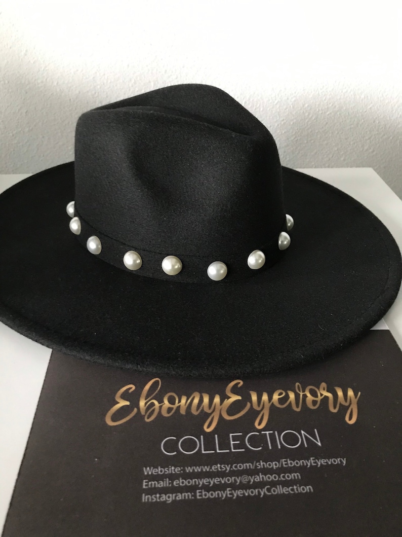 Wide brim black pearl fedora Will look super cute at an outdoor event such as the rodeo! Texas style for sure