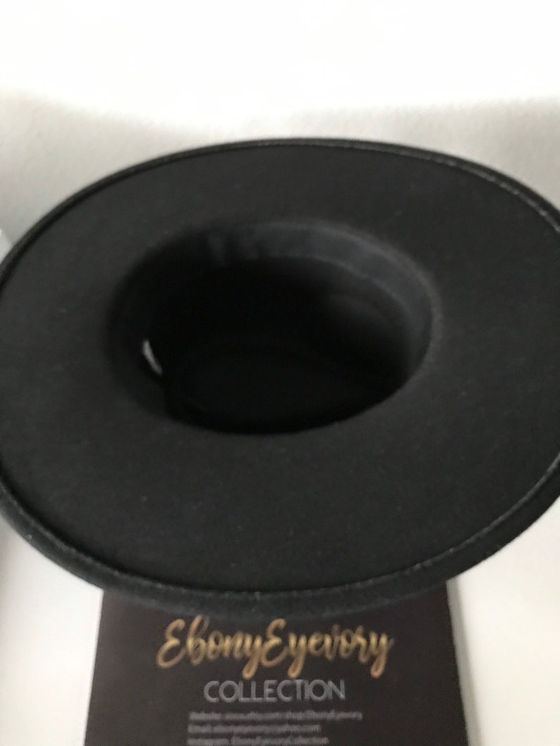 Wide brim black pearl fedora Will look super cute at an outdoor event such as the rodeo! Texas style for sure