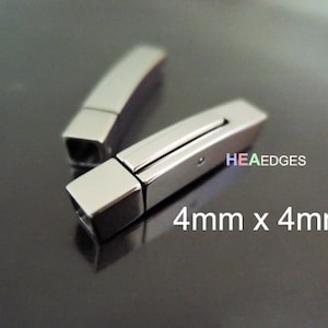 May include: Two silver-toned metal clasps for jewellery making. Each clasp measures 4mm x 4mm.
